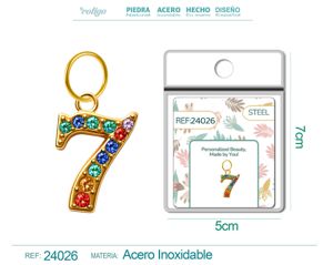 Charm de número 7 de acero dorado con circonita